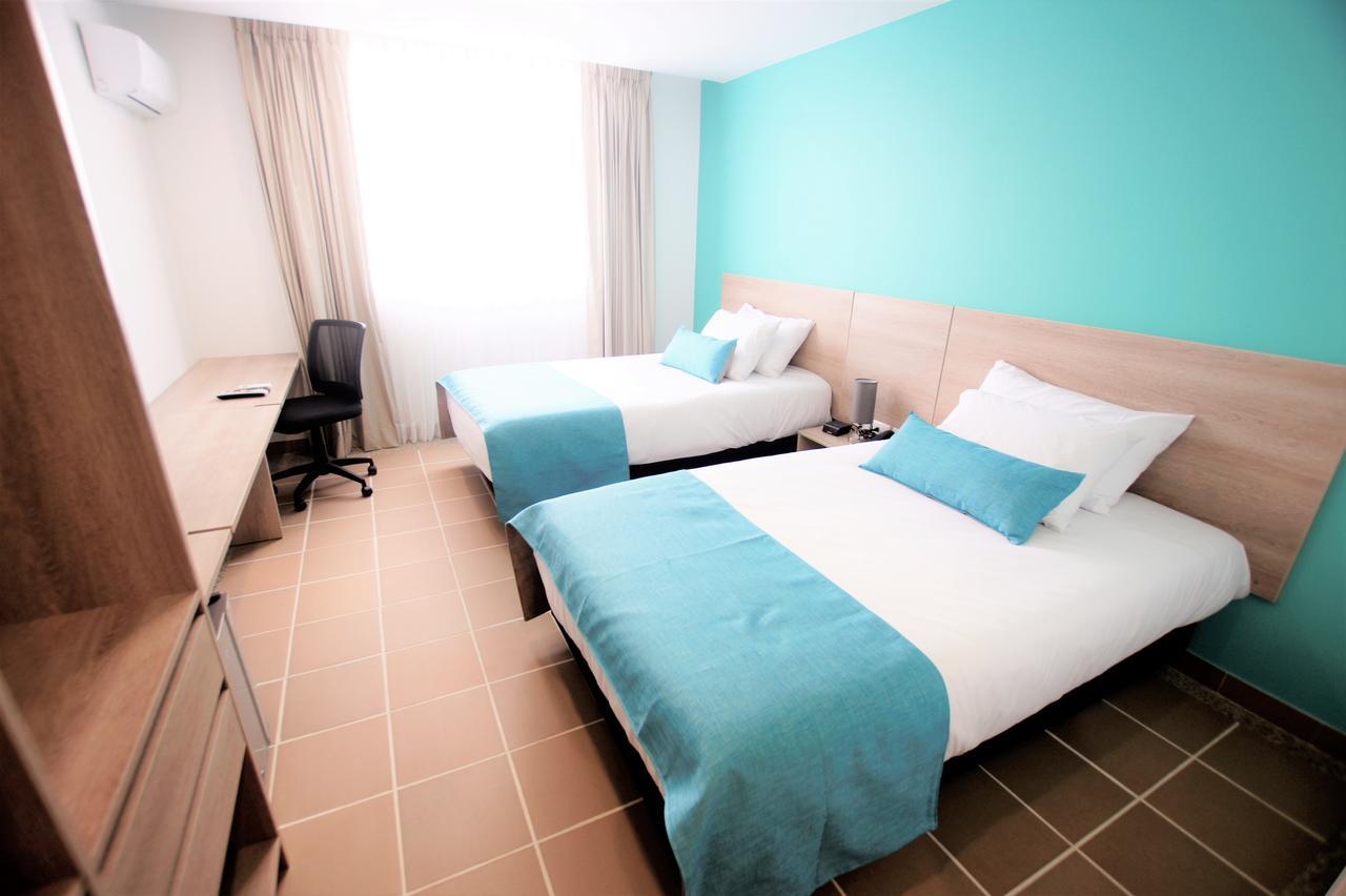 Best Western Puerto Gaitán Екстериор снимка
